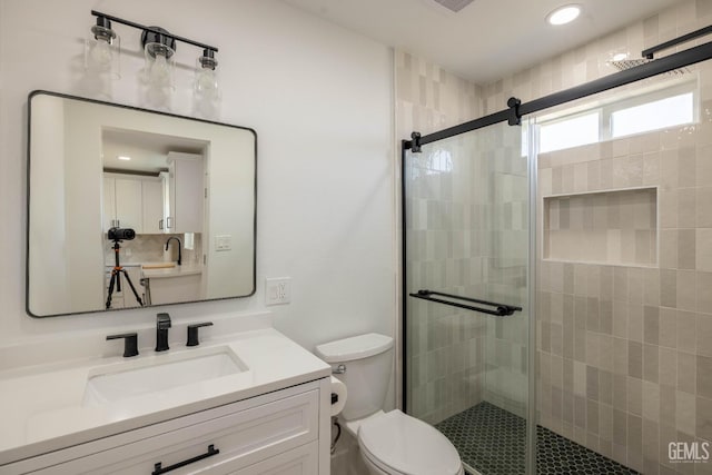 full bath featuring vanity, recessed lighting, toilet, and a shower stall