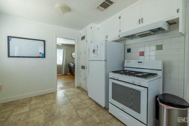 kitchen with visible vents, white appliances, baseboards, white cabinetry, and under cabinet range hood