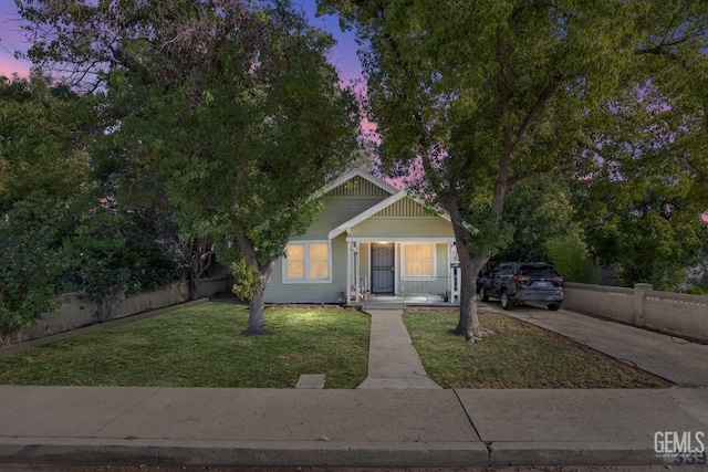 339 Ray St, Bakersfield, CA 93308 - view of front of property with a porch and concrete driveway