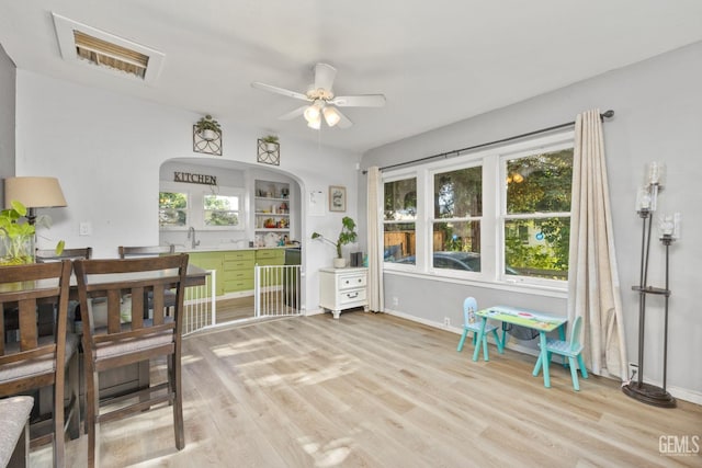 339 Ray St, Bakersfield, CA 93308 - sunroom with a sink and arched walkways