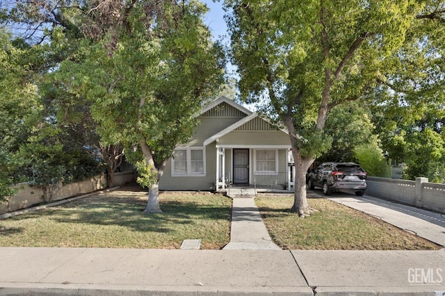 339 Ray St, Bakersfield, CA 93308 - view of front of home featuring a porch and concrete driveway