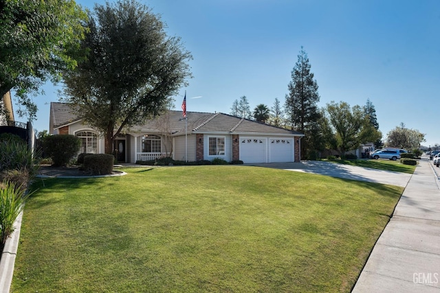 ranch-style home featuring a garage and a front lawn