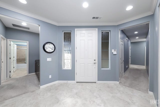 2624 Oakley St, Bakersfield, CA 93311 - entryway featuring light colored carpet, ornamental molding, and baseboards