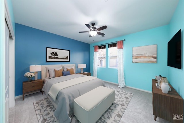 2624 Oakley St, Bakersfield, CA 93311 - bedroom featuring light carpet, baseboards, and a ceiling fan