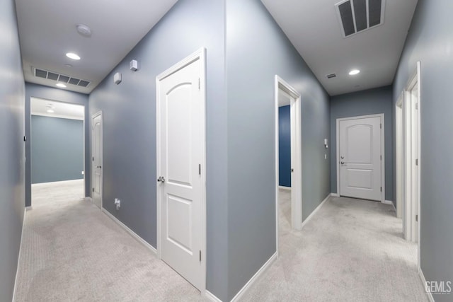 2624 Oakley St, Bakersfield, CA 93311 - corridor featuring light carpet, baseboards, and recessed lighting
