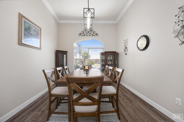 3404 Medallion Rose Ave, Bakersfield, CA 93313 - dining space with dark wood finished floors, ornamental molding, and baseboards