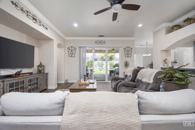 3404 Medallion Rose Ave, Bakersfield, CA 93313 - living area with arched walkways, a ceiling fan, crown molding, wood finished floors, and baseboards