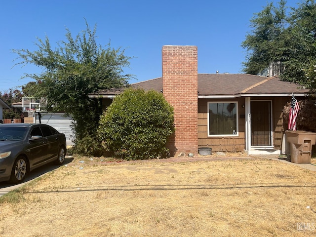 507 Mcdonald Way, Bakersfield, CA 93309 - view of front of home featuring a chimney and a shingled roof