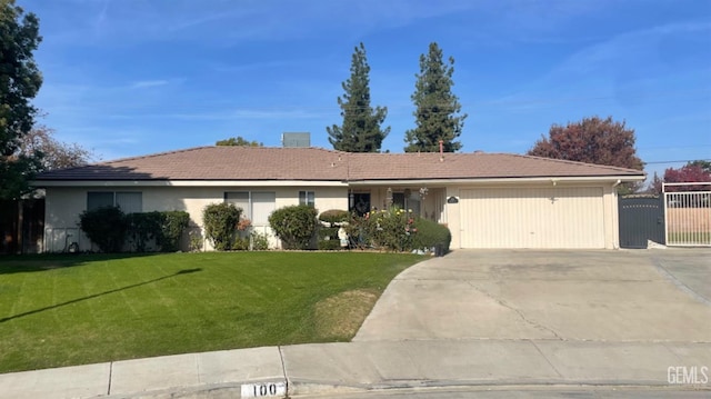 ranch-style house with a front lawn and a garage