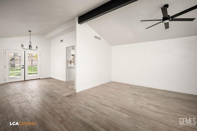 unfurnished room with hardwood / wood-style floors, beamed ceiling, ceiling fan with notable chandelier, and high vaulted ceiling