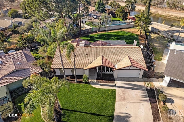 drone / aerial view featuring a water view