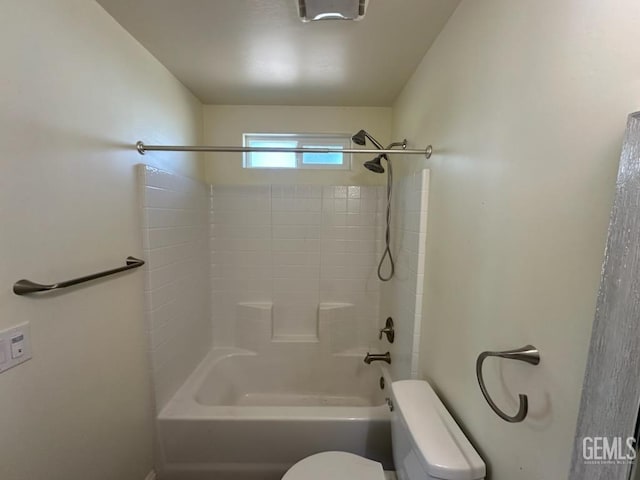 bathroom featuring toilet and shower / bath combination