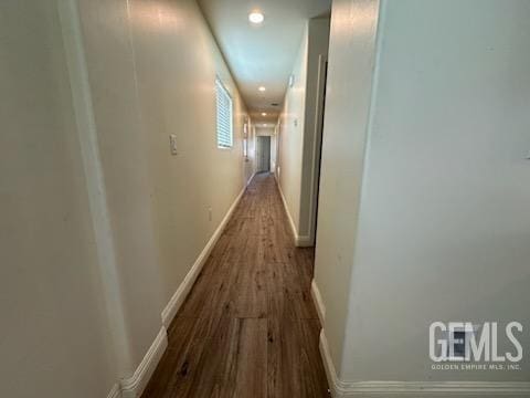 hall featuring dark wood-type flooring