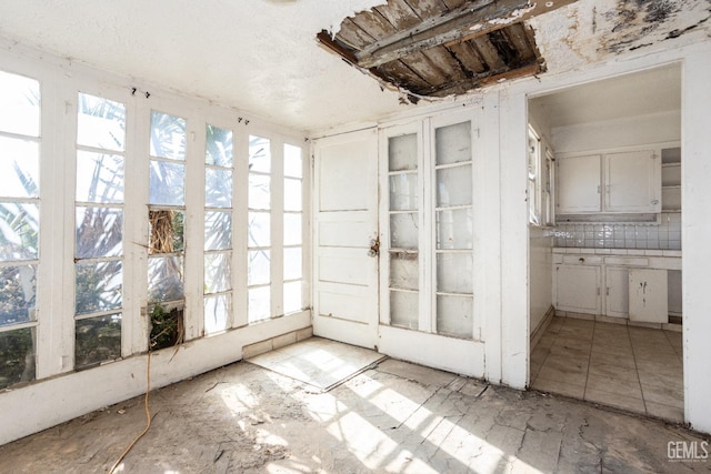 view of unfurnished sunroom