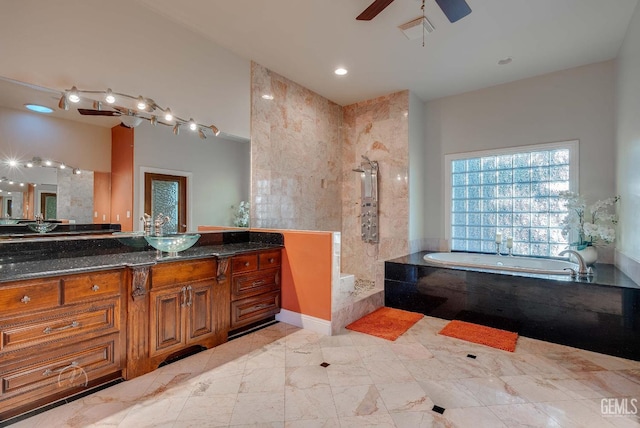9446 E Kern River Ave, Bakersfield, CA 93308 - bathroom featuring a garden tub, a ceiling fan, vanity, and recessed lighting