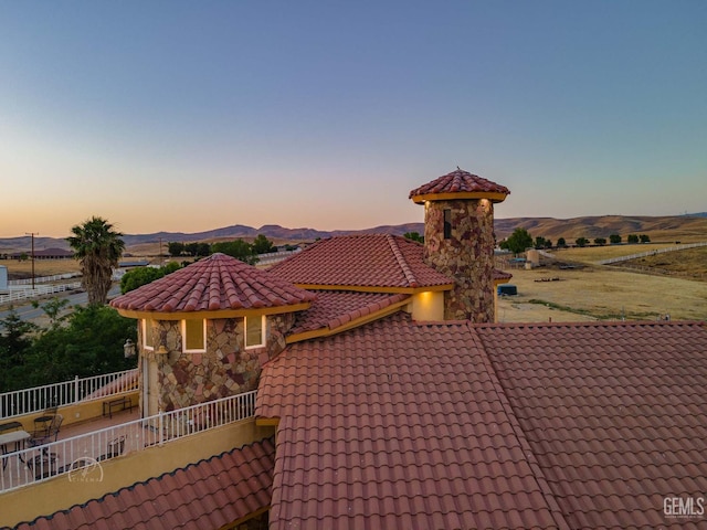 9446 E Kern River Ave, Bakersfield, CA 93308 - view of front facade featuring a tiled roof and a mountain view