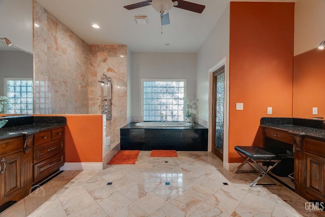 9446 E Kern River Ave, Bakersfield, CA 93308 - bathroom featuring a bath, healthy amount of natural light, marble tiled floors, and ceiling fan