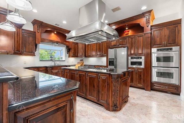 9446 E Kern River Ave, Bakersfield, CA 93308 - kitchen with island range hood, stainless steel appliances, a kitchen island, dark stone counters, and recessed lighting