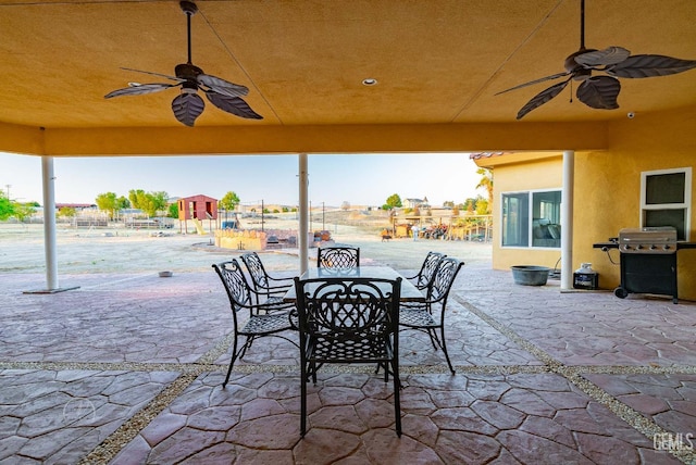 9446 E Kern River Ave, Bakersfield, CA 93308 - view of patio featuring ceiling fan, grilling area, and outdoor dining area