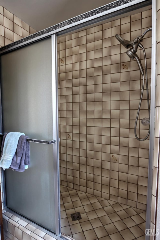 bathroom featuring an enclosed shower