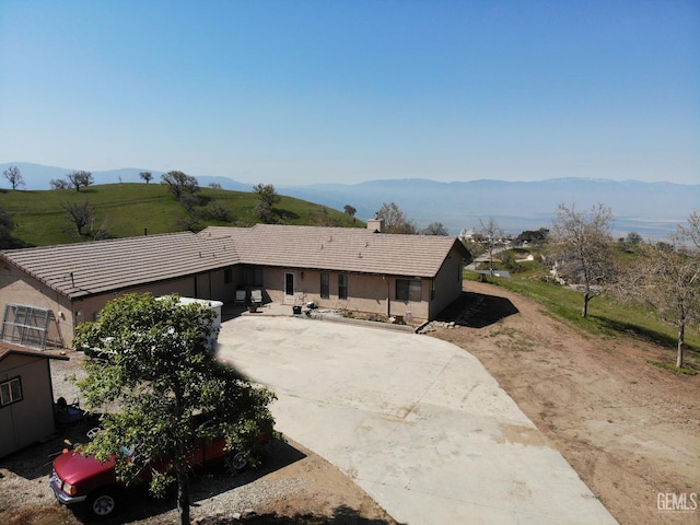 exterior space with a mountain view