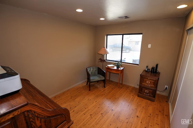 sitting room with light wood-type flooring