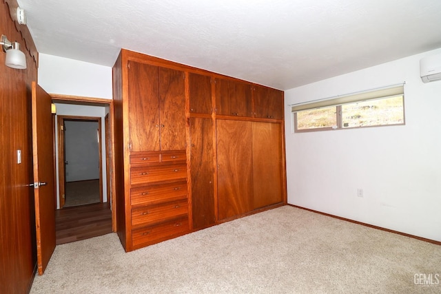 unfurnished bedroom featuring light colored carpet