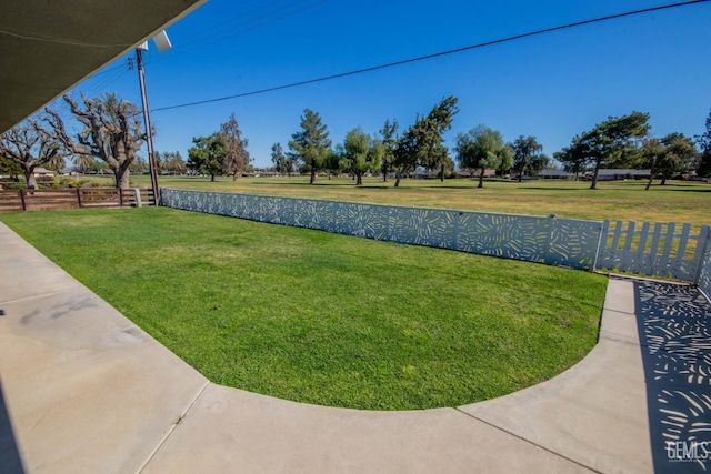 view of yard featuring fence