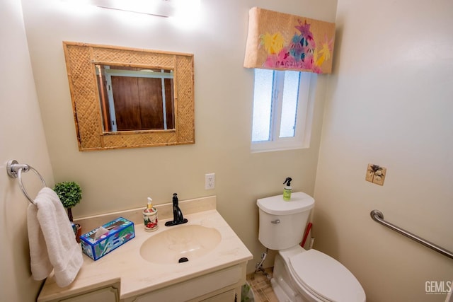 half bath with vanity and toilet