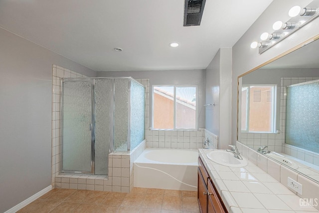 full bath with tile patterned floors, visible vents, a shower stall, vanity, and a bath