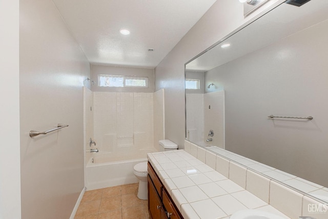 full bathroom with vanity, shower / washtub combination, tile patterned flooring, and toilet