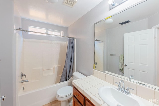 bathroom featuring visible vents, toilet, shower / tub combo with curtain, tile patterned flooring, and vanity