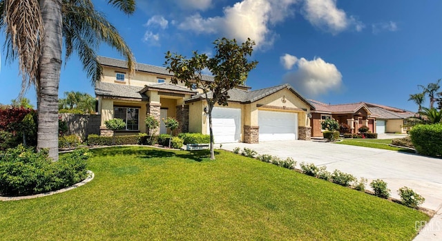 view of front of property with stucco siding, an attached garage, stone siding, driveway, and a front lawn