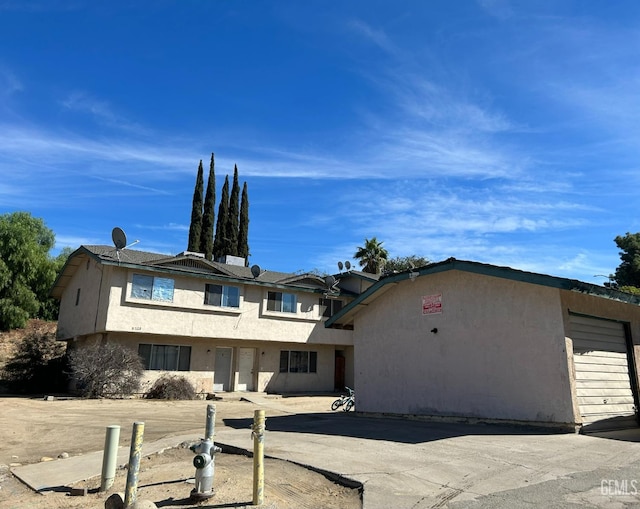 view of property with stucco siding