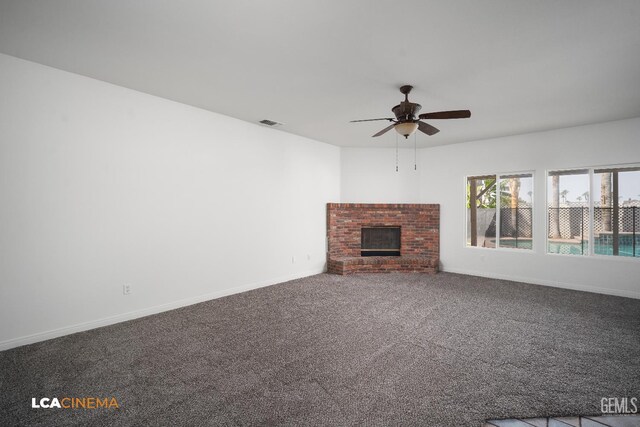 6307 San Rogue Ct, Bakersfield, CA 93312 - unfurnished living room with a fireplace, ceiling fan, carpet floors, and baseboards