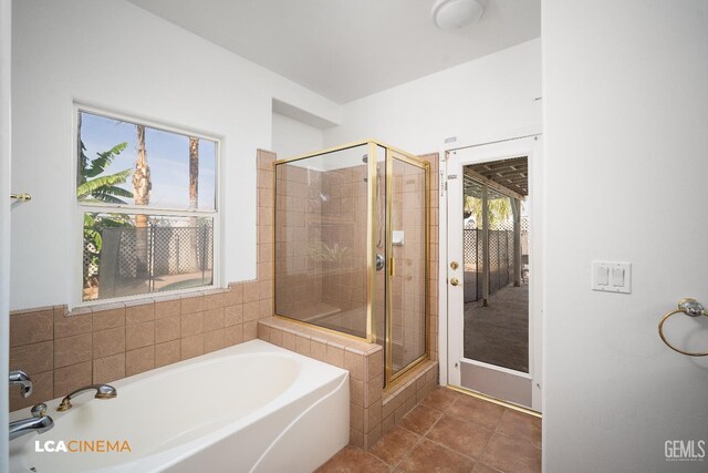 6307 San Rogue Ct, Bakersfield, CA 93312 - full bathroom with a stall shower, a bath, and tile patterned floors