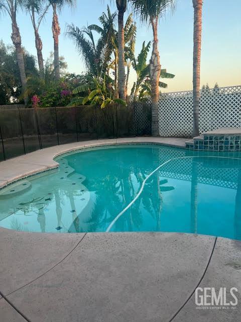 6307 San Rogue Ct, Bakersfield, CA 93312 - view of pool at dusk