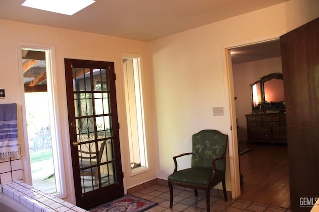 interior space featuring plenty of natural light and tile patterned flooring