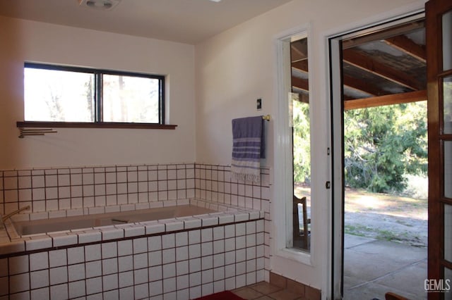 bathroom with tile patterned floors