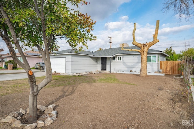 1800 Hughes Ln, Bakersfield, CA 93304 - view of front facade with a garage, concrete driveway, and roof with shingles