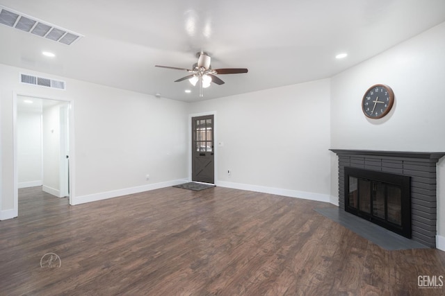 1800 Hughes Ln, Bakersfield, CA 93304 - unfurnished living room featuring a ceiling fan, baseboards, recessed lighting, a fireplace, and dark wood-type flooring