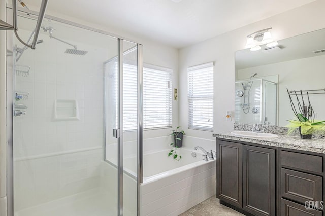 3647 Monument Hills Ave, Rosamond, CA 93560 - bathroom with vanity, a shower stall, and a garden tub