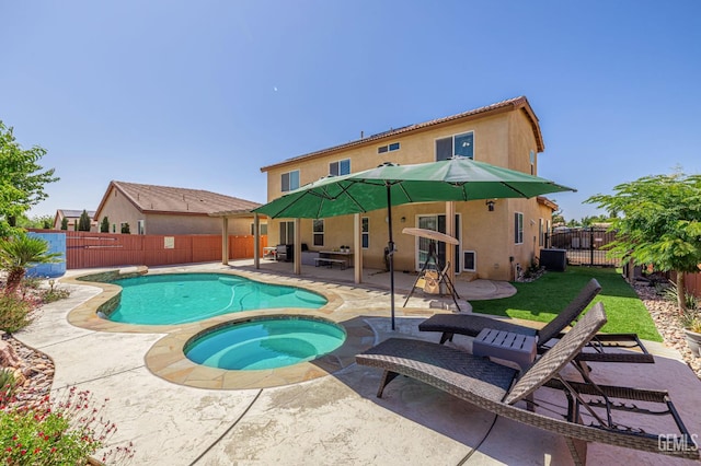 3647 Monument Hills Ave, Rosamond, CA 93560 - view of pool featuring an in-ground hot tub, a fenced backyard, and a patio area