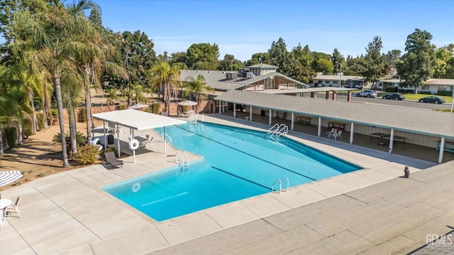 pool featuring a patio area