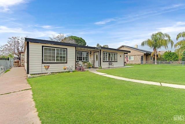 ranch-style house with a front lawn