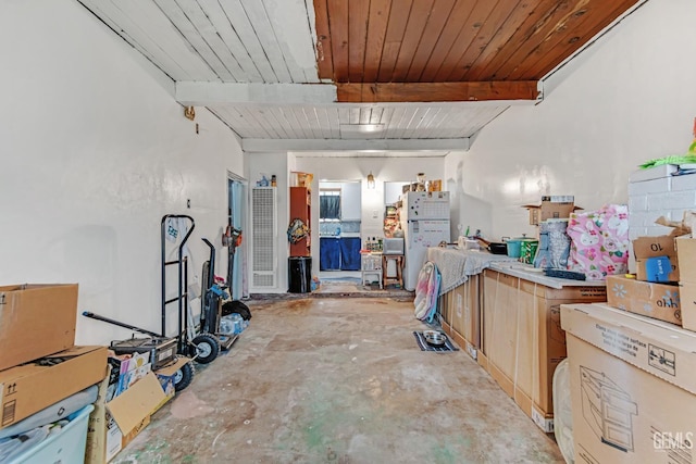 miscellaneous room featuring beamed ceiling and wooden ceiling