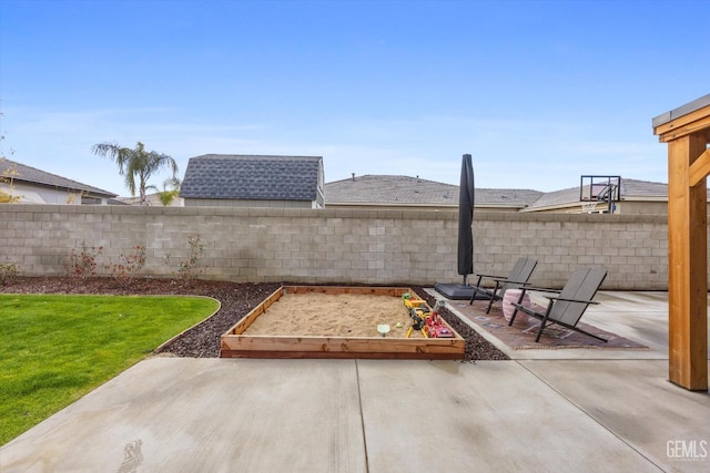 view of patio / terrace with a fenced backyard and a garden