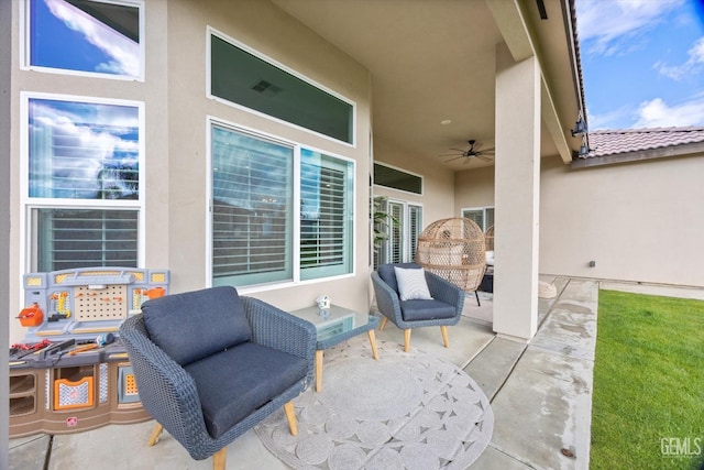 view of patio / terrace featuring a ceiling fan