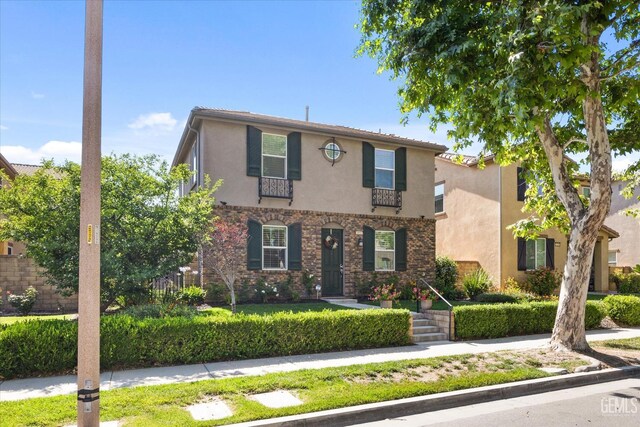28537 Vista Del Rio Dr, Valencia, CA 91354 - mediterranean / spanish house with stucco siding and brick siding