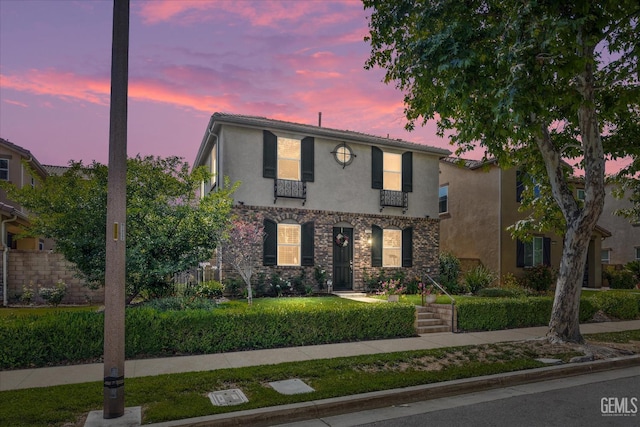 28537 Vista Del Rio Dr, Valencia, CA 91354 - mediterranean / spanish house featuring stucco siding and stone siding